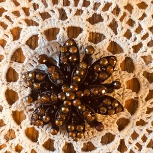 Vintage 2” Brooch gold  like stones.